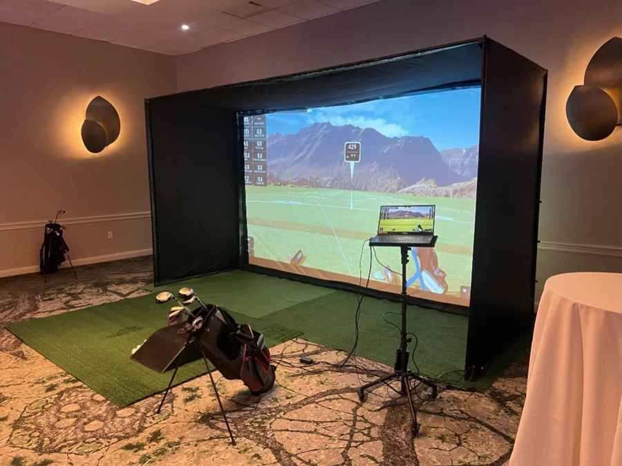 Indoor golf rental in Boston with realistic fairways, ball flight data, and multiplayer modes