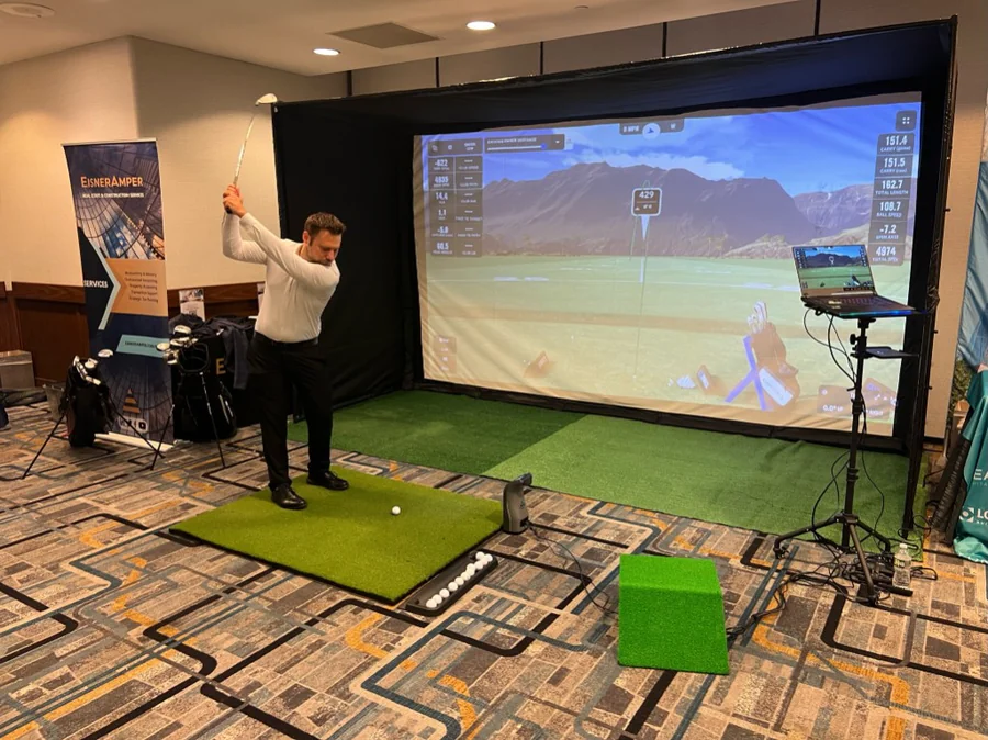 Book a golf simulator in Boston for birthdays, office parties, and holiday celebrations