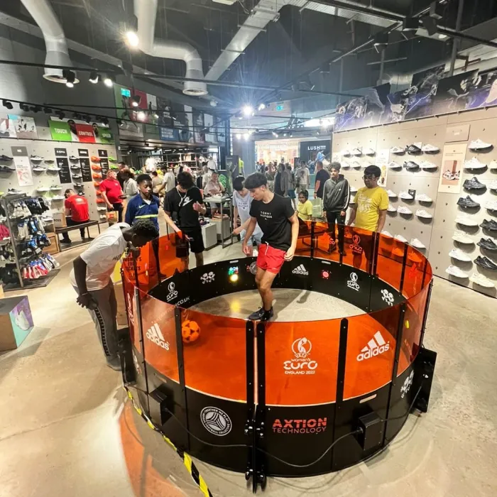 Soccer reaction ring rental setup at a fan zone with crowd engagement