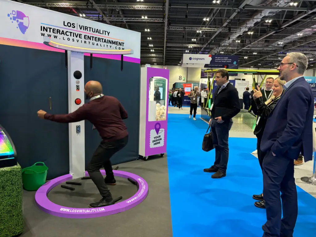 catch falling stick challenge game at the trade show
