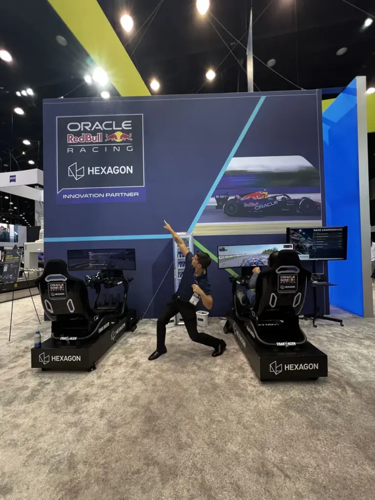 Two Hexagon and Oracle Red Bull Racing branded racing simulators with a live leaderboard at IMTS 2026, McCormick Place, Chicago