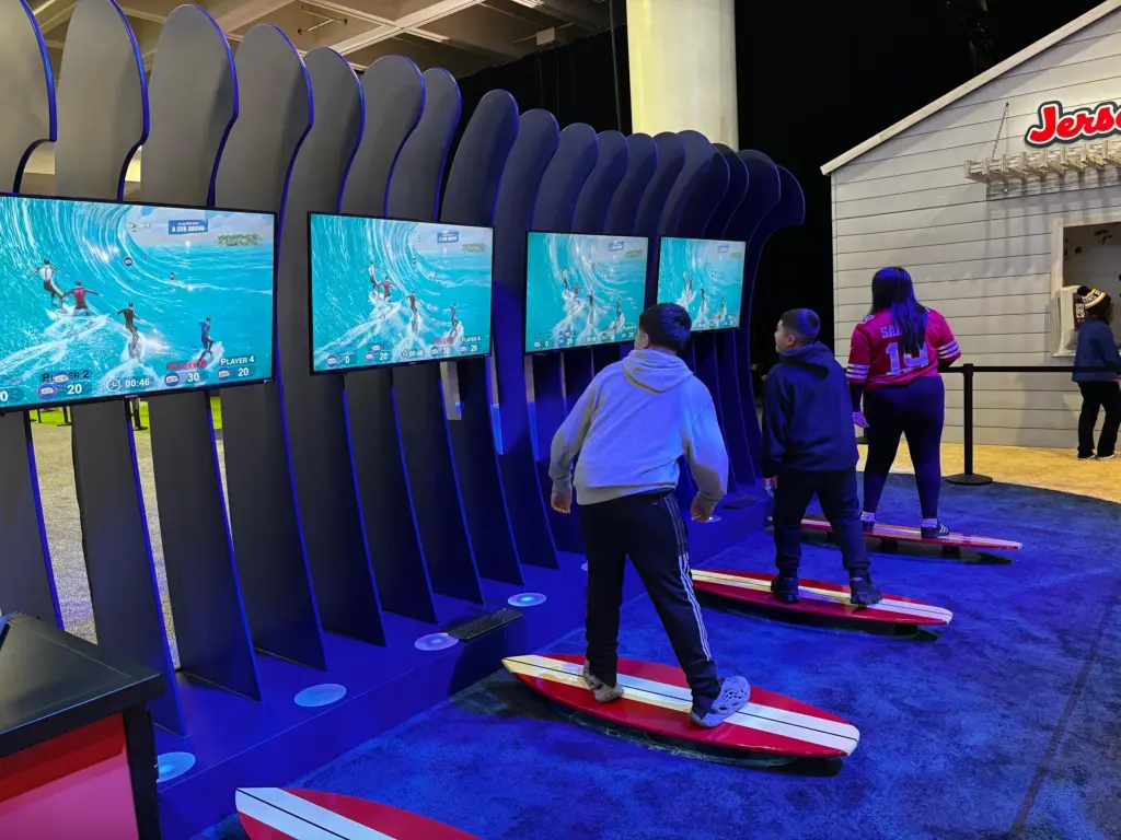 Guests riding Jersey Mike’s branded surf simulators at the Super Bowl LX Experience, Moscone Center, San Francisco