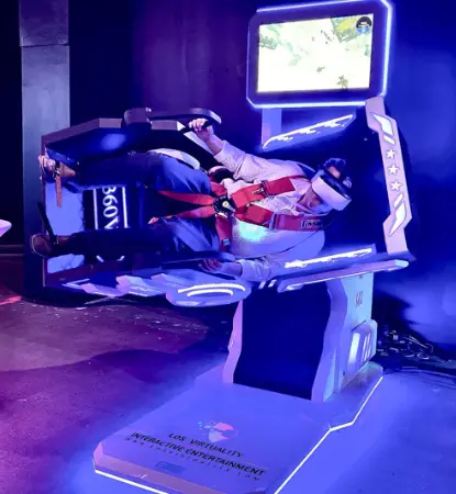 360 VR simulator rental with a motion seat and VR headset under purple event lighting