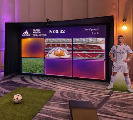 Soccer ball kicked at a screen to reveal a branded image in the Goal Shot Image Reveal game